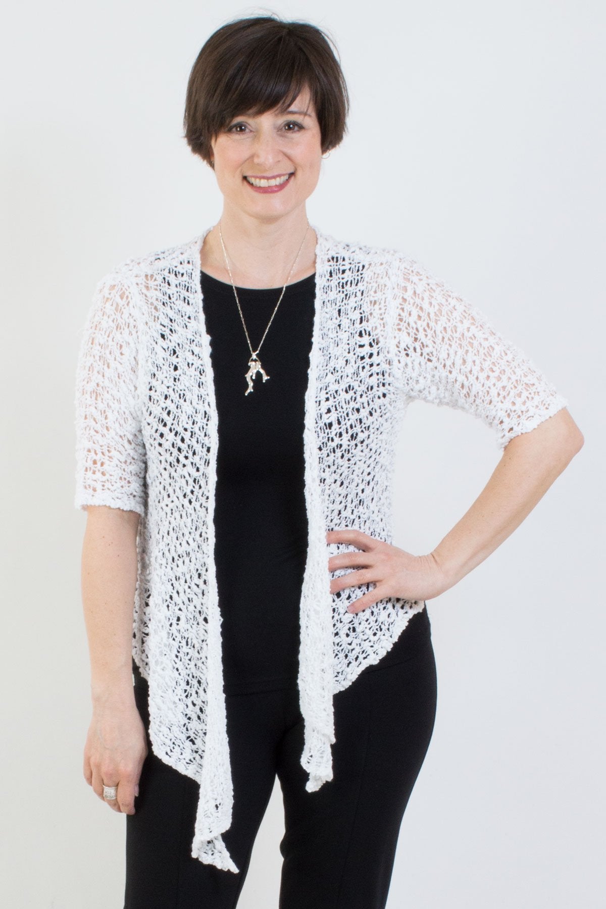 Women's short lightweight 3/4 sleeve sheer popcorn shrug.