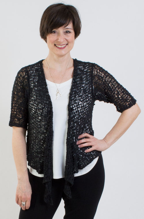 Women's short lightweight 3/4 sleeve sheer popcorn shrug.