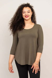Front view of woman wearing olive green 3/4 sleeve bamboo top