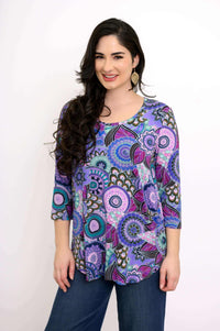 Jazz 3/4 top in Carnival print close-up with model smiling