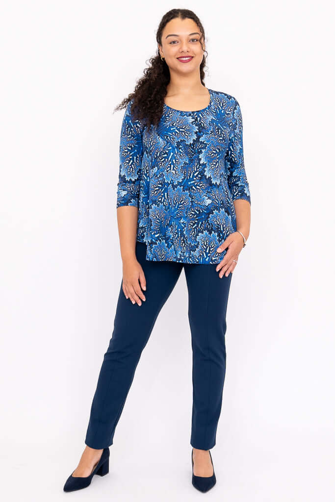 Model facing forward in Jazz 3/4 Sleeve Bamboo Top paired with navy trousers