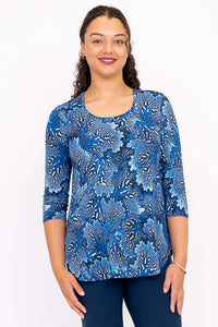 Front view of model wearing Jazz 3/4 Sleeve Bamboo Top in blue mosaic print
