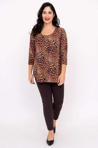 Full body shot of woman wearing Jazz 3/4 Sleeve Leopard Top and dark pants