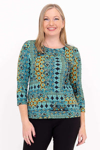 Front view of woman wearing Margorie fitted 3/4 sleeve tee in vibrant turquoise yellow print