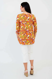 Back view of Jazz 3/4 sleeve top showing tangerine splash print and relaxed fit