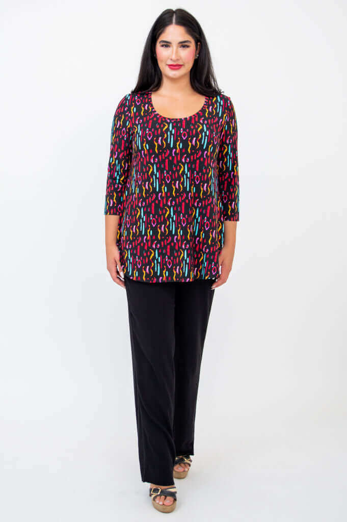 Full front view of Jazz 3/4 Sleeve Top styled with black pants