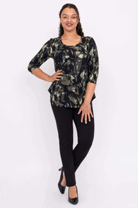 Model with hand on hip in Jazz 3/4 sleeve abstract print top