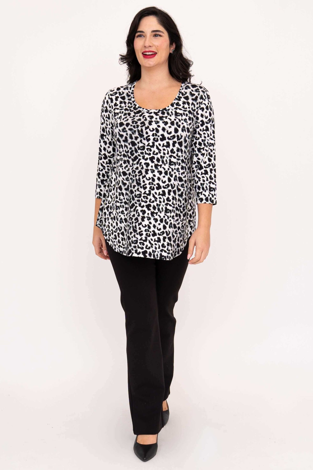 Model walking in Jazz 3/4 sleeve leopard print bamboo top