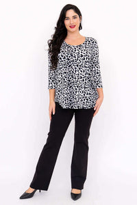 Full body view of model in Jazz 3/4 sleeve leopard top and black pants