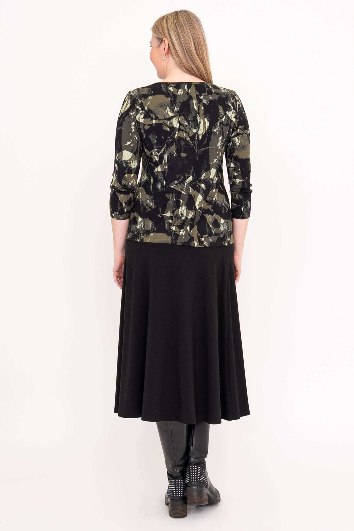 Back view of black brushstroke 3/4 sleeve top and black skirt outfit