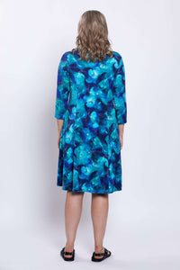 Back view of Callie bamboo dress in blue with A-line shape and 3/4 sleeves