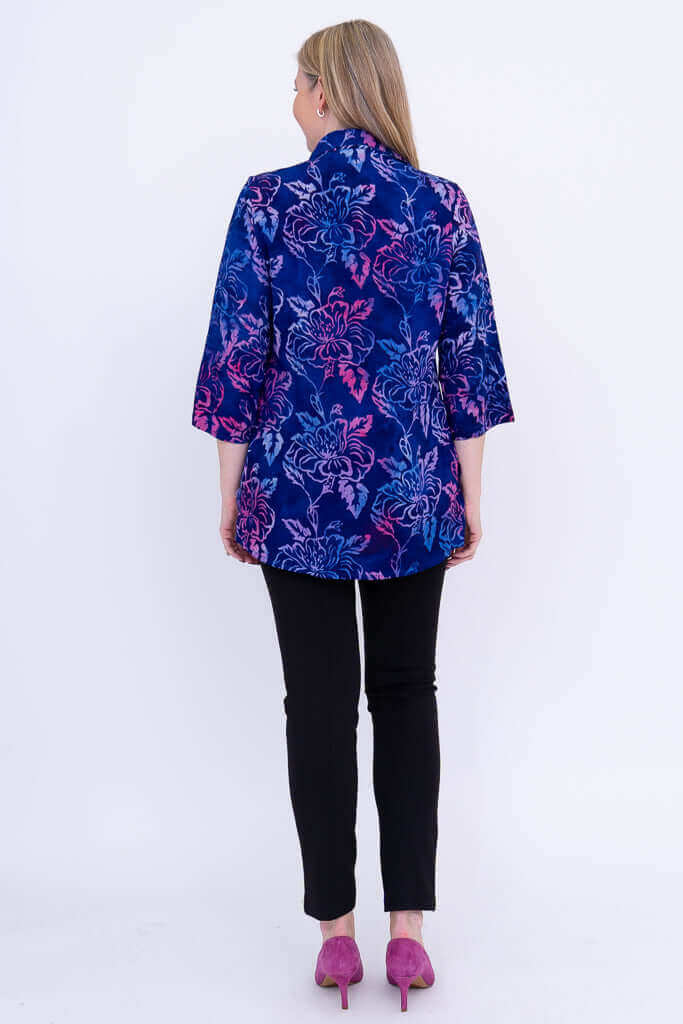 Back view of blue and pink floral Cindy smocked blouse with 3/4 sleeves