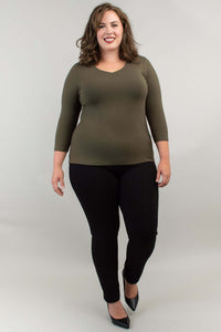 Back view of model wearing olive green bamboo top with 3/4 sleeves