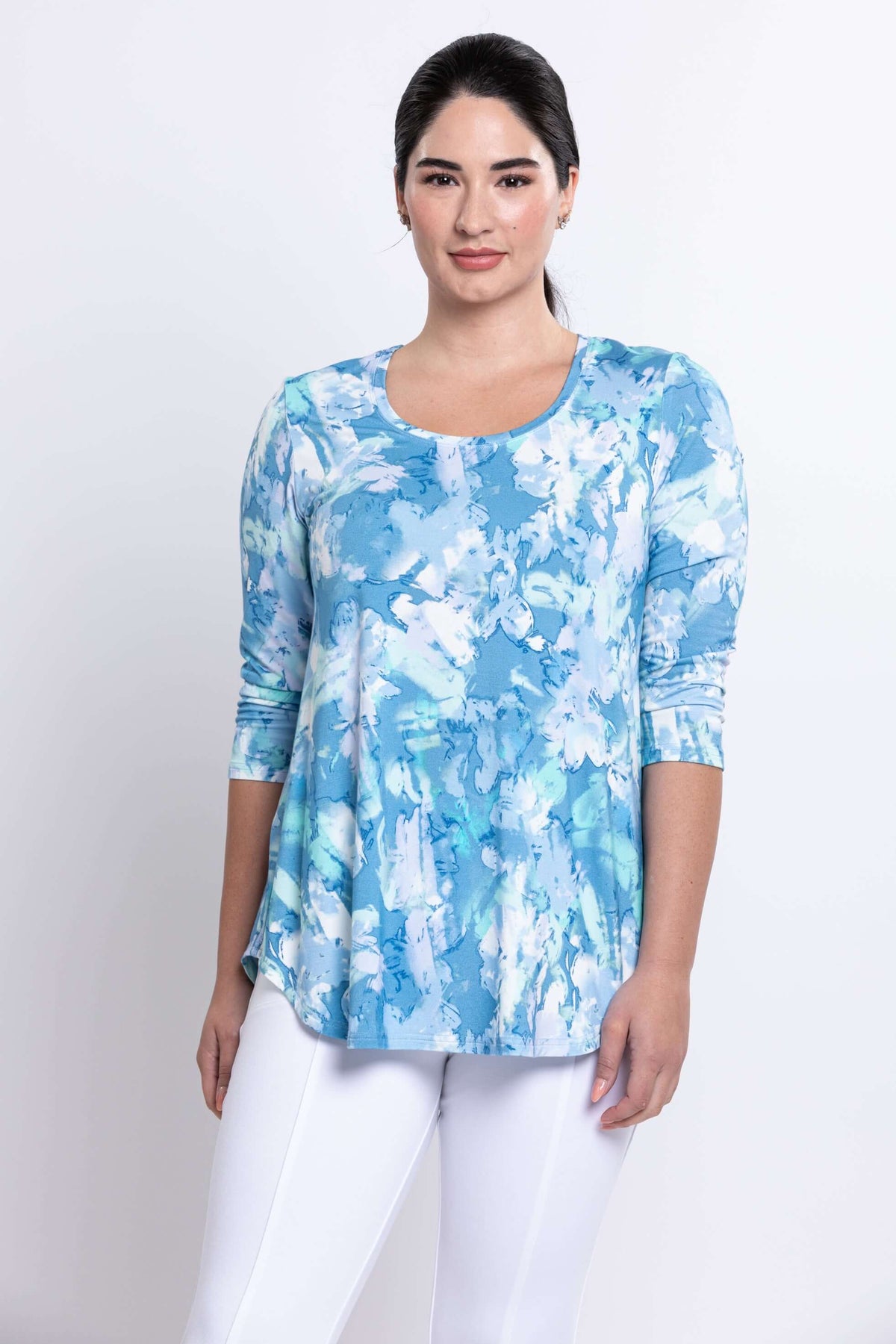 Front view of woman wearing a blue haze print bamboo top with 3/4 sleeves