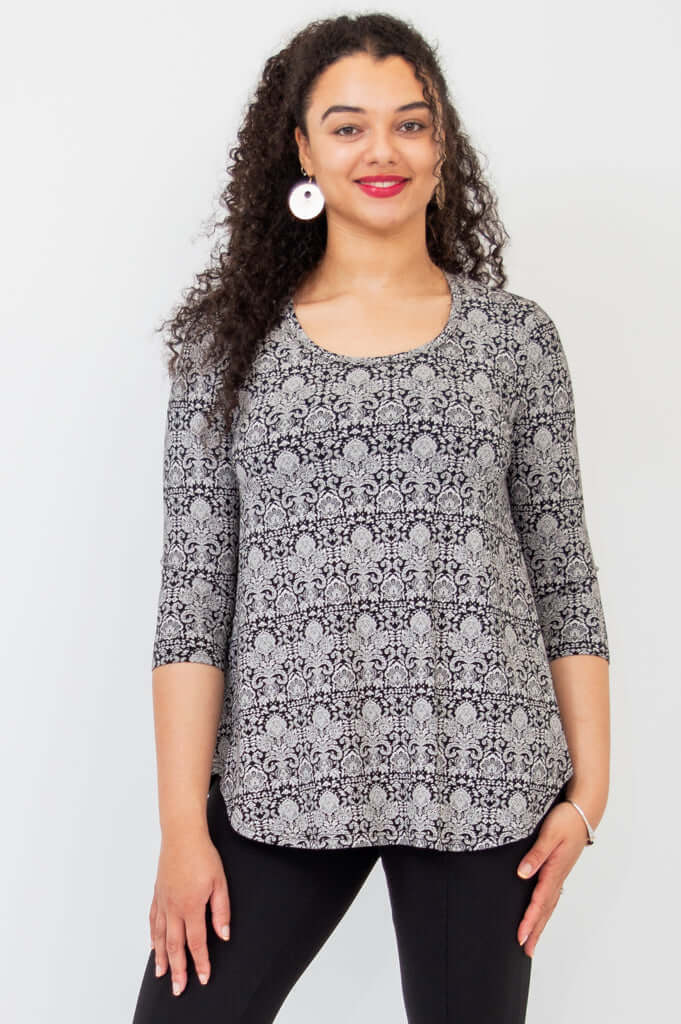 Front view of model wearing the Jazz Bamboo Top in black damask pattern with 3/4 sleeves