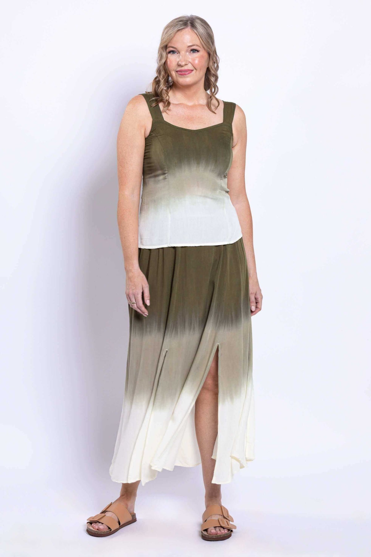 Angled front view of olive ombre maxi skirt with slits