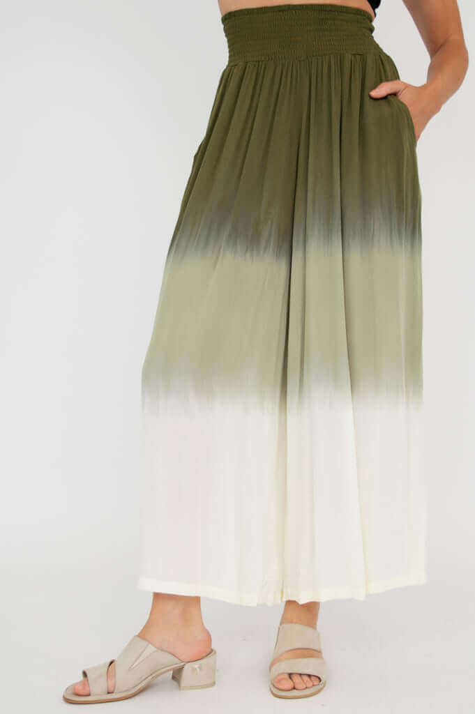 Angled view of olive ombre wide leg pants showing side pockets