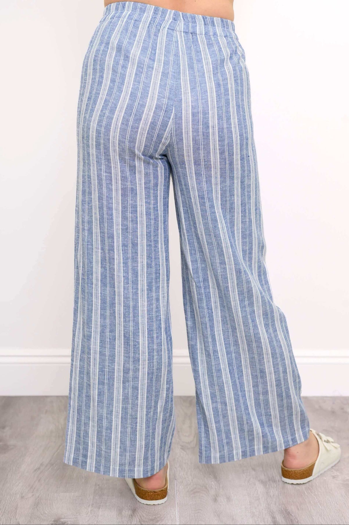 Back view of the Parker Pant in blue and white vertical stripes