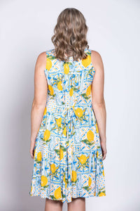 Close-up back of sleeveless dress showing tie detail and lemon print