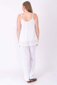 Back view of model wearing white Chantilly Lace Tank and pants