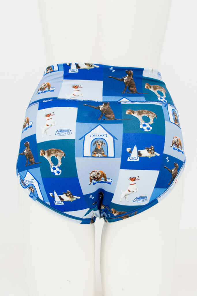 Back view of blue high-waist briefs with assorted dog and bone motifs