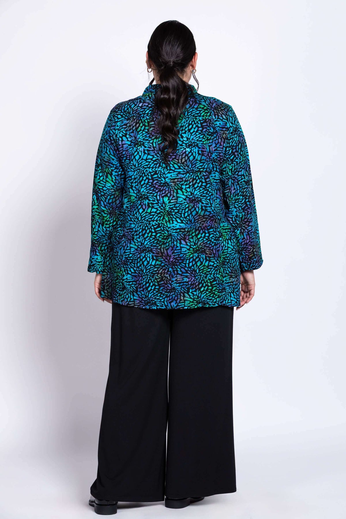Back view of Shirley Blouse Mosaic Indigo highlighting the vibrant all-over print