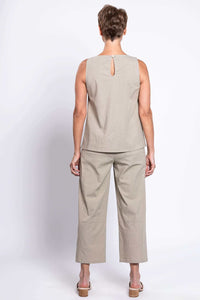 Back view of woman in taupe sleeveless tank top with button closure and matching pants