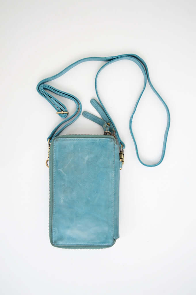 Back view of the azure woven leather crossbody wallet