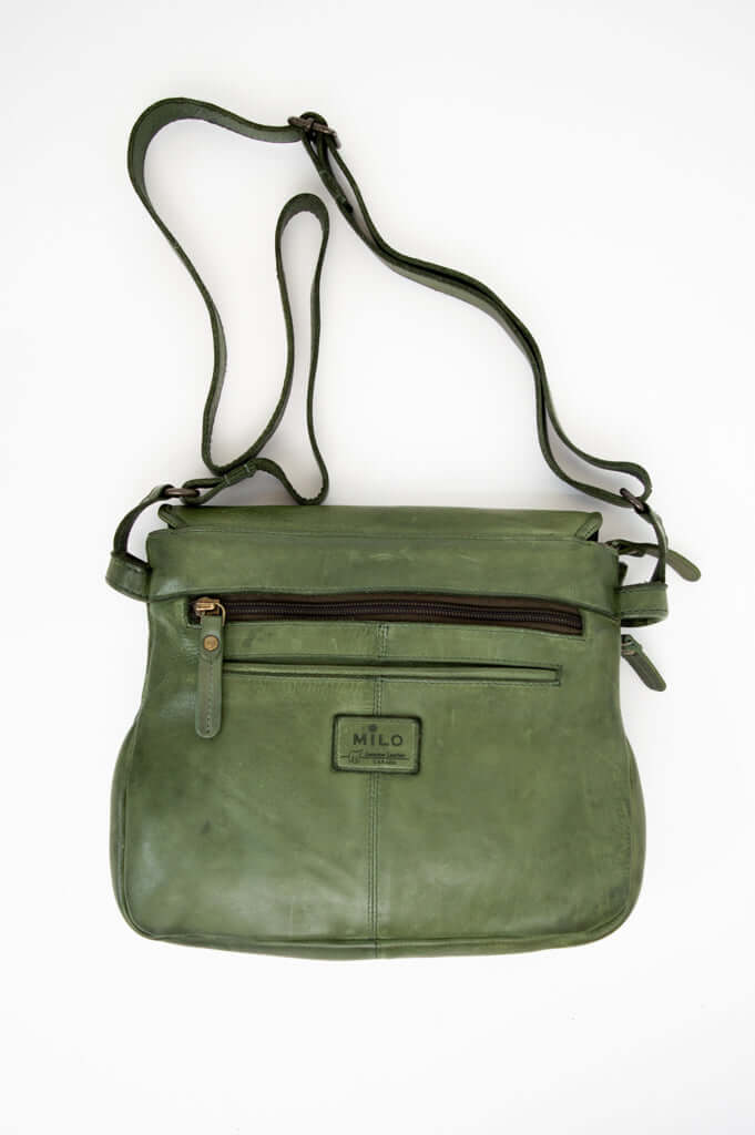 Back view of olive leather crossbody bag displaying zipper pocket and brand label