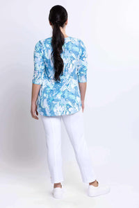 Back view of model in blue watercolor Jazz Top showing rear fit