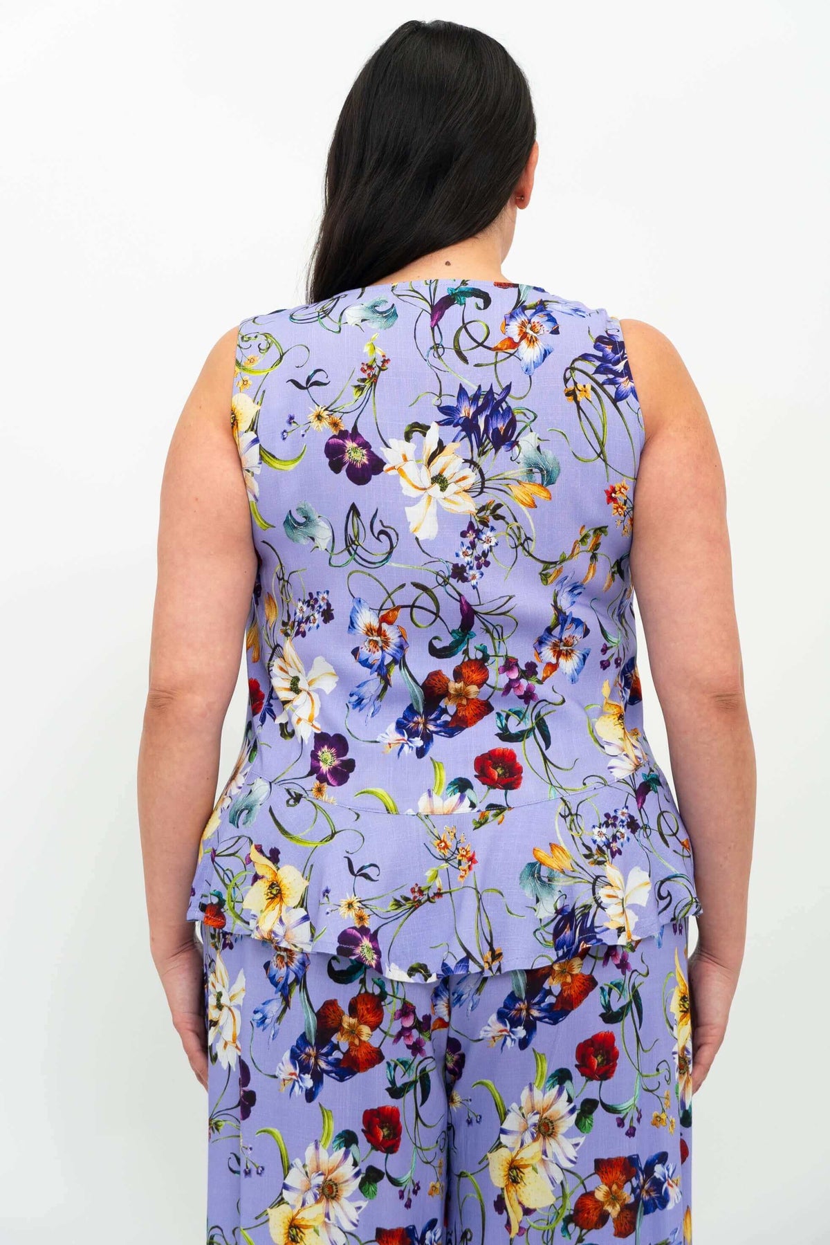 Back view of model wearing Ginny Tank in lavender floral print