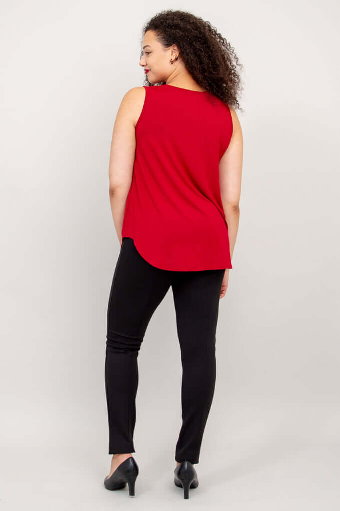 Back view of model wearing cherry red Jazz Bamboo Tank Top showing the A-line hem