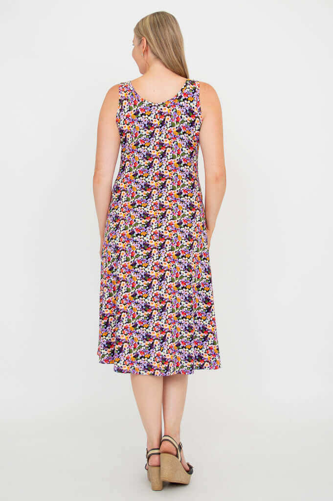Back view of model showing full floral tank dress