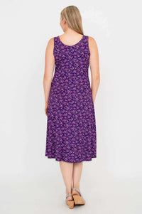 Back view of Evangelina tank dress in purple floral print, showing full length