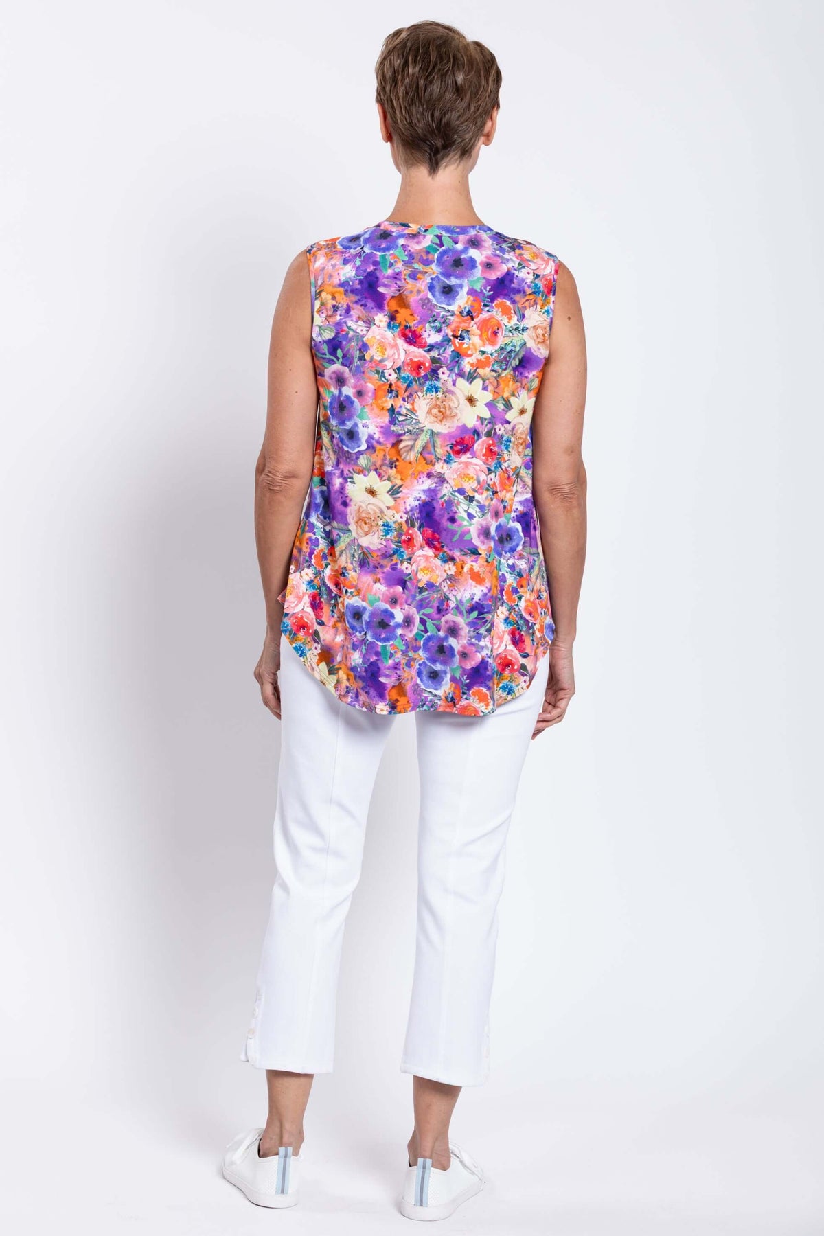 Back view of woman wearing Jackie floral sleeveless V-neck bamboo top