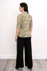 Back view of model showing details of floral bamboo linen blouse