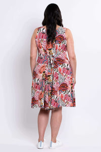 Back view of dress showing tie belt detail and vibrant floral print