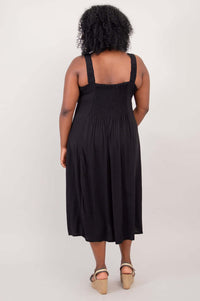 Back view of dress showing shirred bodice and thick straps