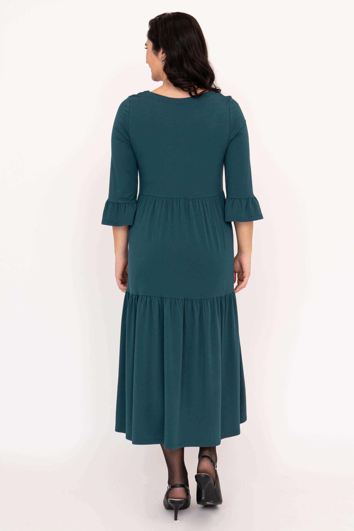 Back view of teal Bernadette Long Dress highlighting tiered design