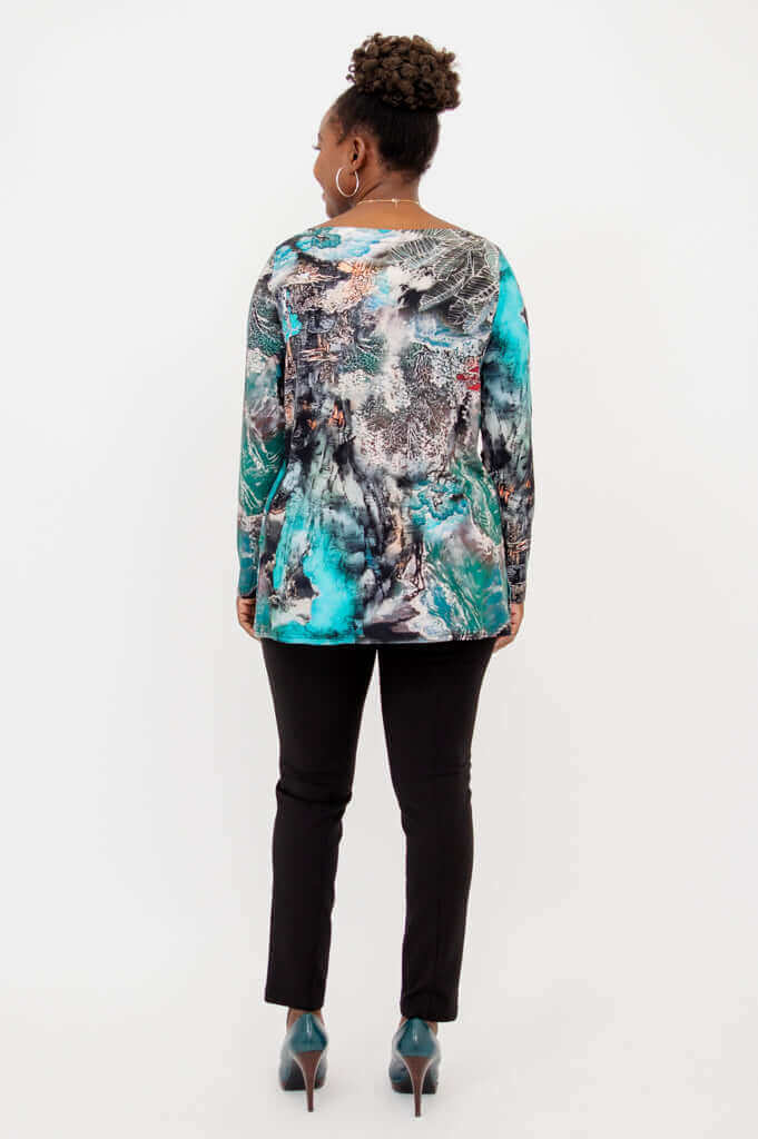 Back view of the artistic print boatneck bamboo top worn by model