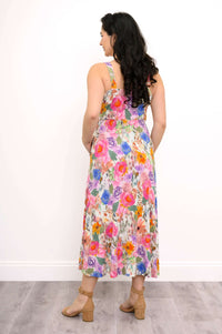 Back view of a woman in a colorful floral bamboo dress
