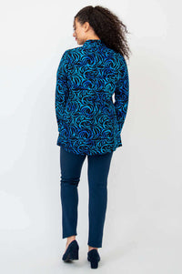 Back view of model wearing Cindy smocked blue swirl shirt