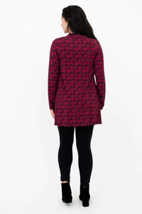Back view of Edwina tunic highlighting the full-length floral pattern