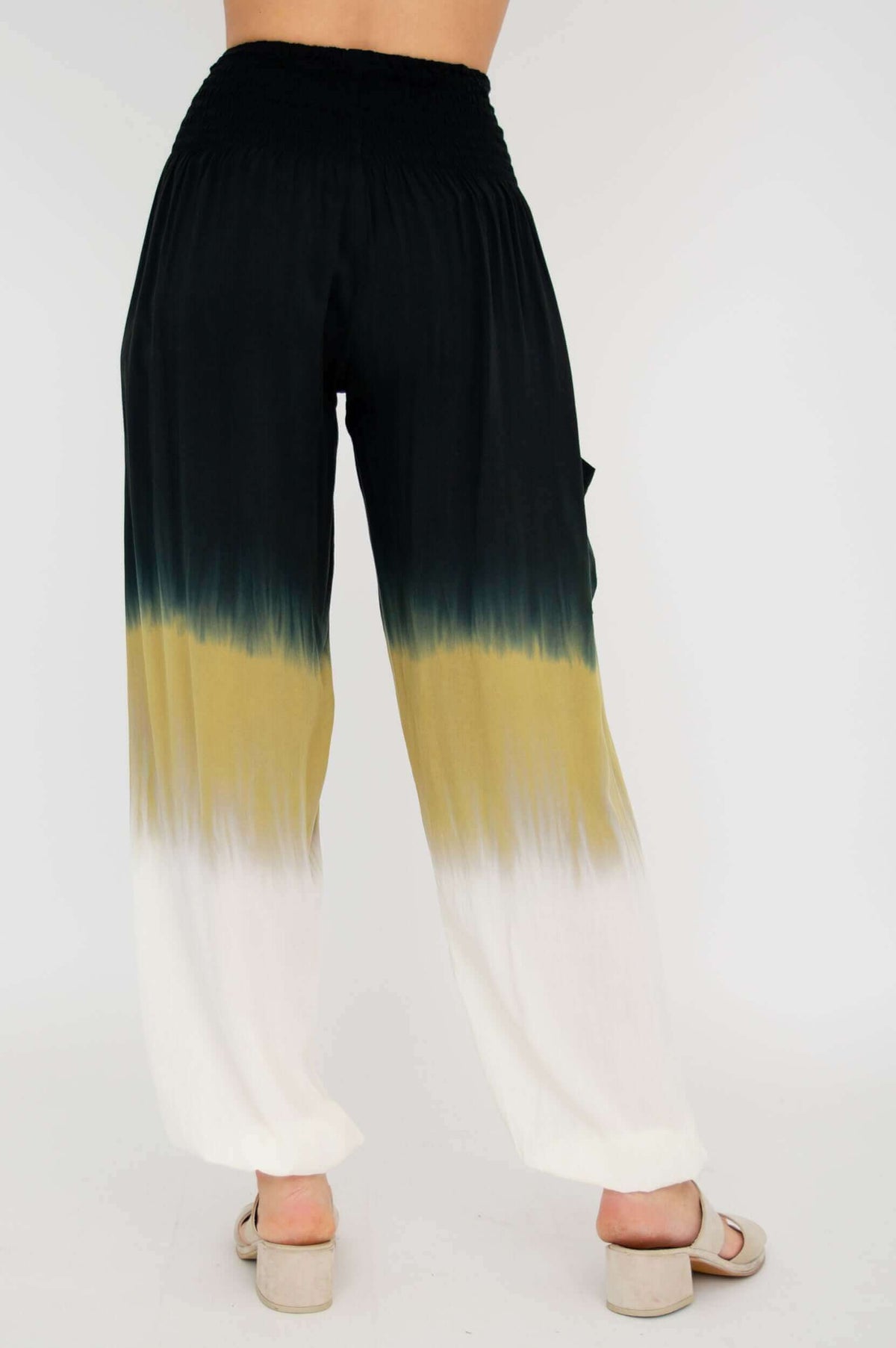 Back view of Embra ombre pants with gradient design and relaxed silhouette