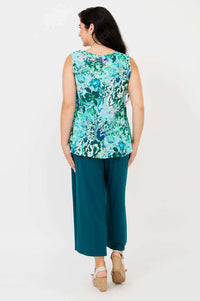 Back view of Ginny Tank, floral pattern, wide shoulder straps and slight peplum hem