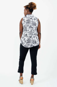 Back view of model wearing the Hula quarter zip tank showing detailed print
