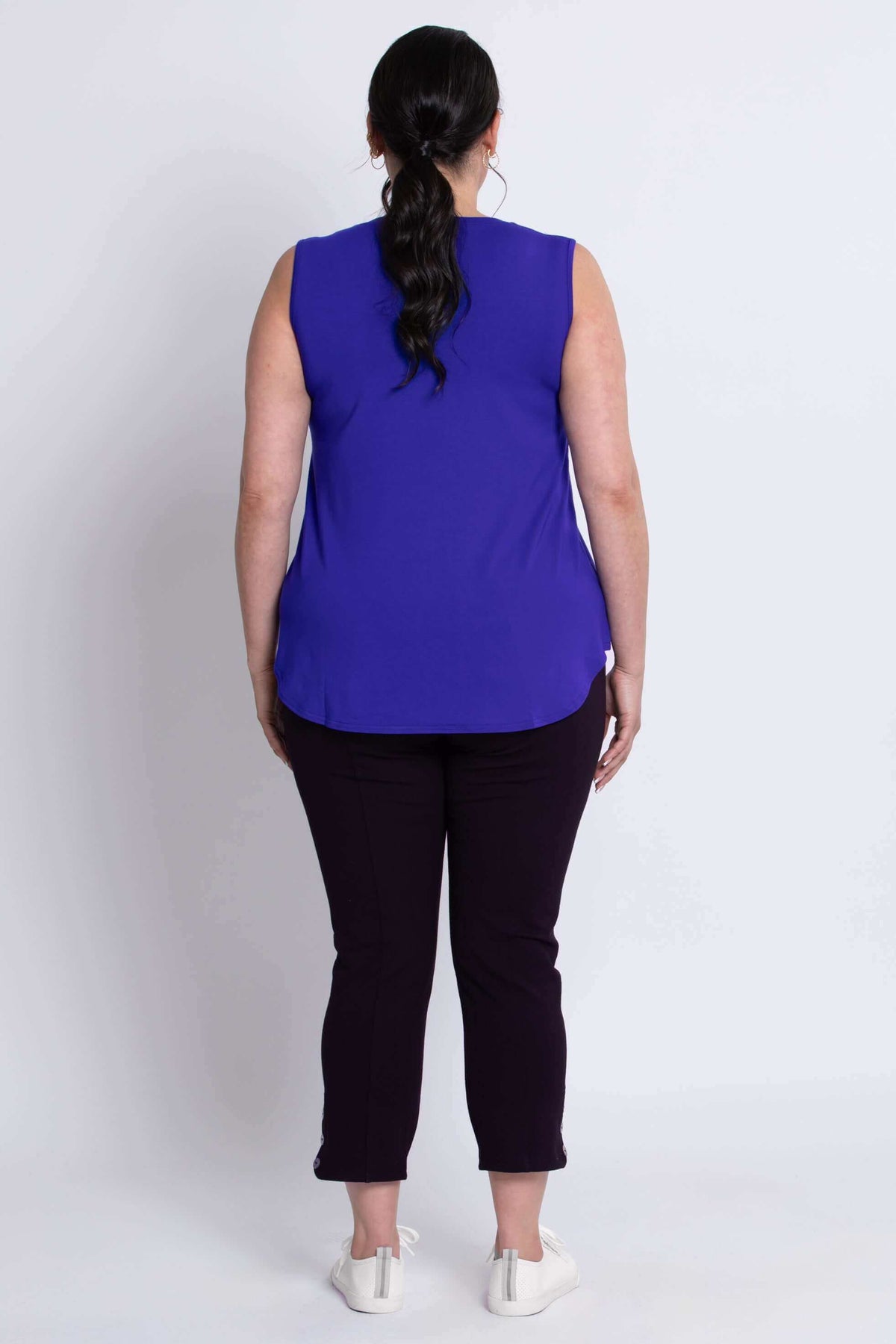 Back view of model in Jackie bamboo sleeveless top showing length and fit
