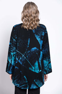 Rear view of a woman showcasing the back design of a black and blue Batik blouse