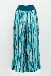 Back view of teal and blue striped Landon Capri pants showing flowy wide-leg fit