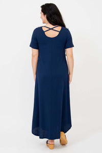 Back view of navy maxi dress with criss-cross straps and rounded hem